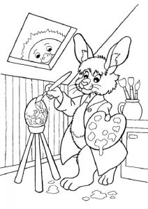 Rysunek z królikiem malującym pisankę do kolorowania
